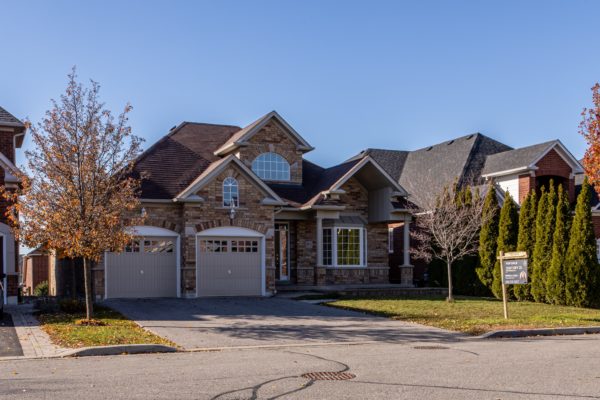 foreclosure sign on house for sale.