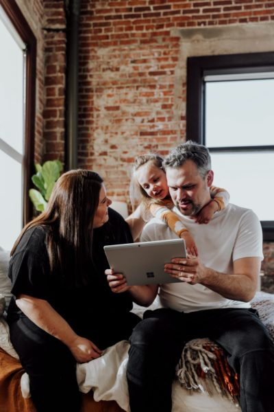 a mom and dad working on getting someone to cosign for their mortgage