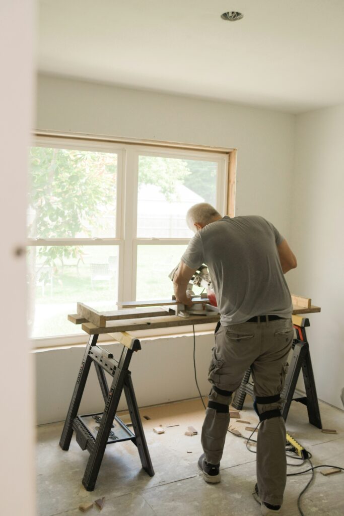 a man doing renovations for his purchase plus improvement mortgage 